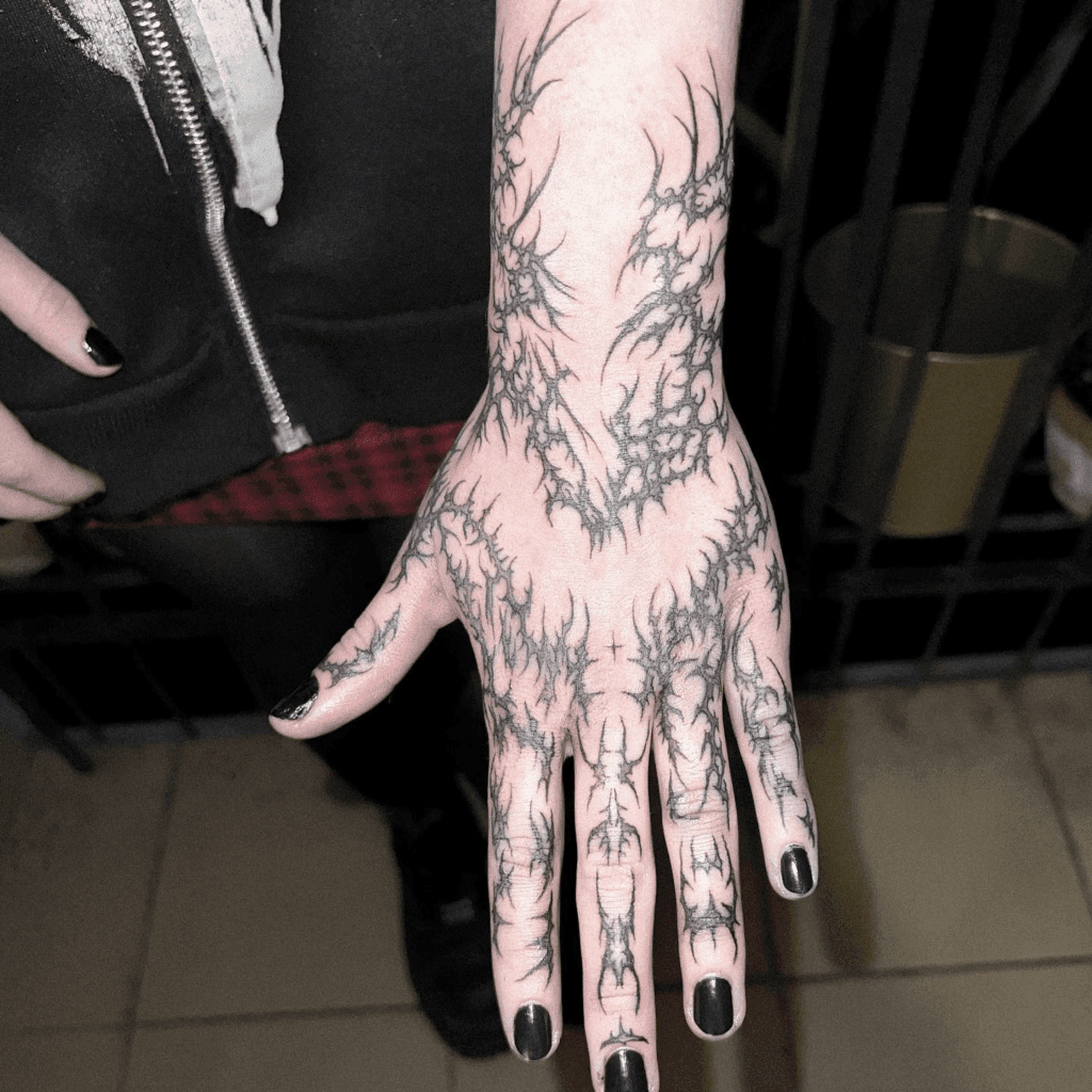 Cyber sigilism hand tattoo