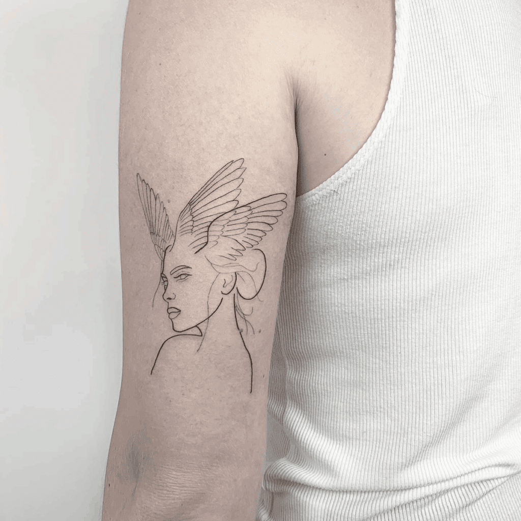 Wings Bicep Tattoo