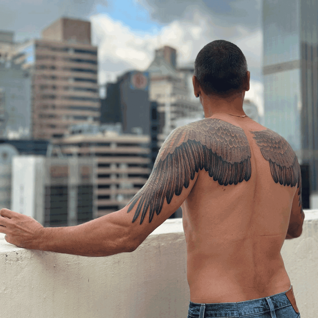 Wings Bicep Tattoo