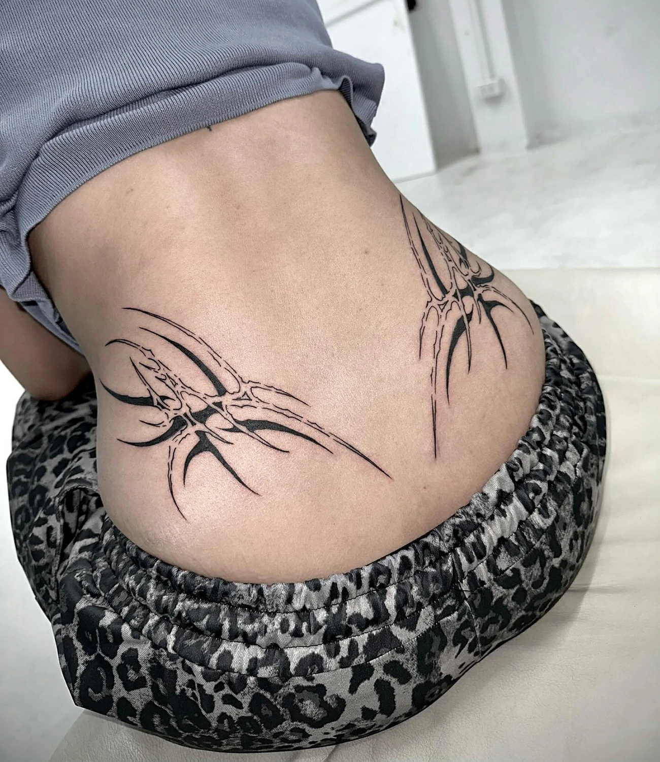 Cyber sigilism back tattoo