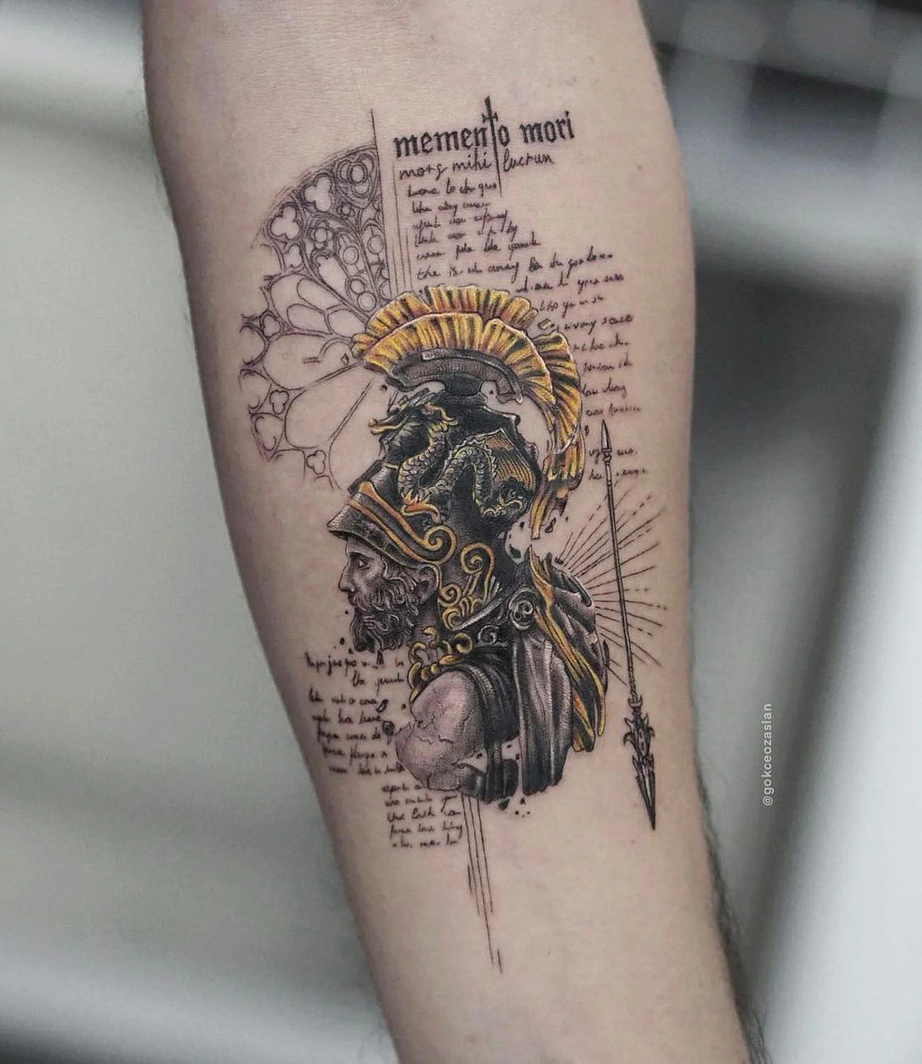 memento mori hand tattoo: A smaller "memento mori" tattoo placed on the hand, possibly on the back of the hand or along the fingers.