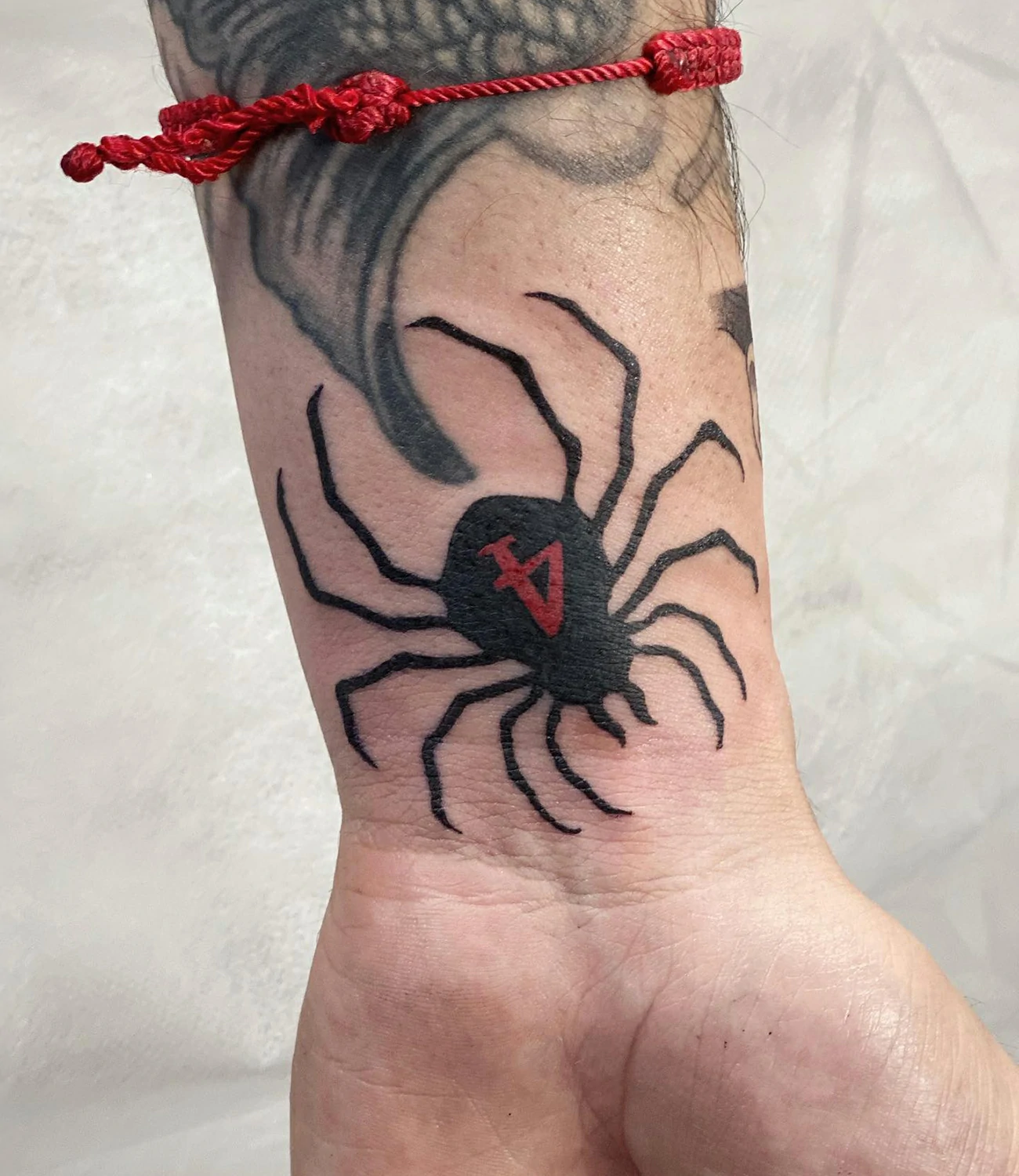 Hisoka spider tattoo