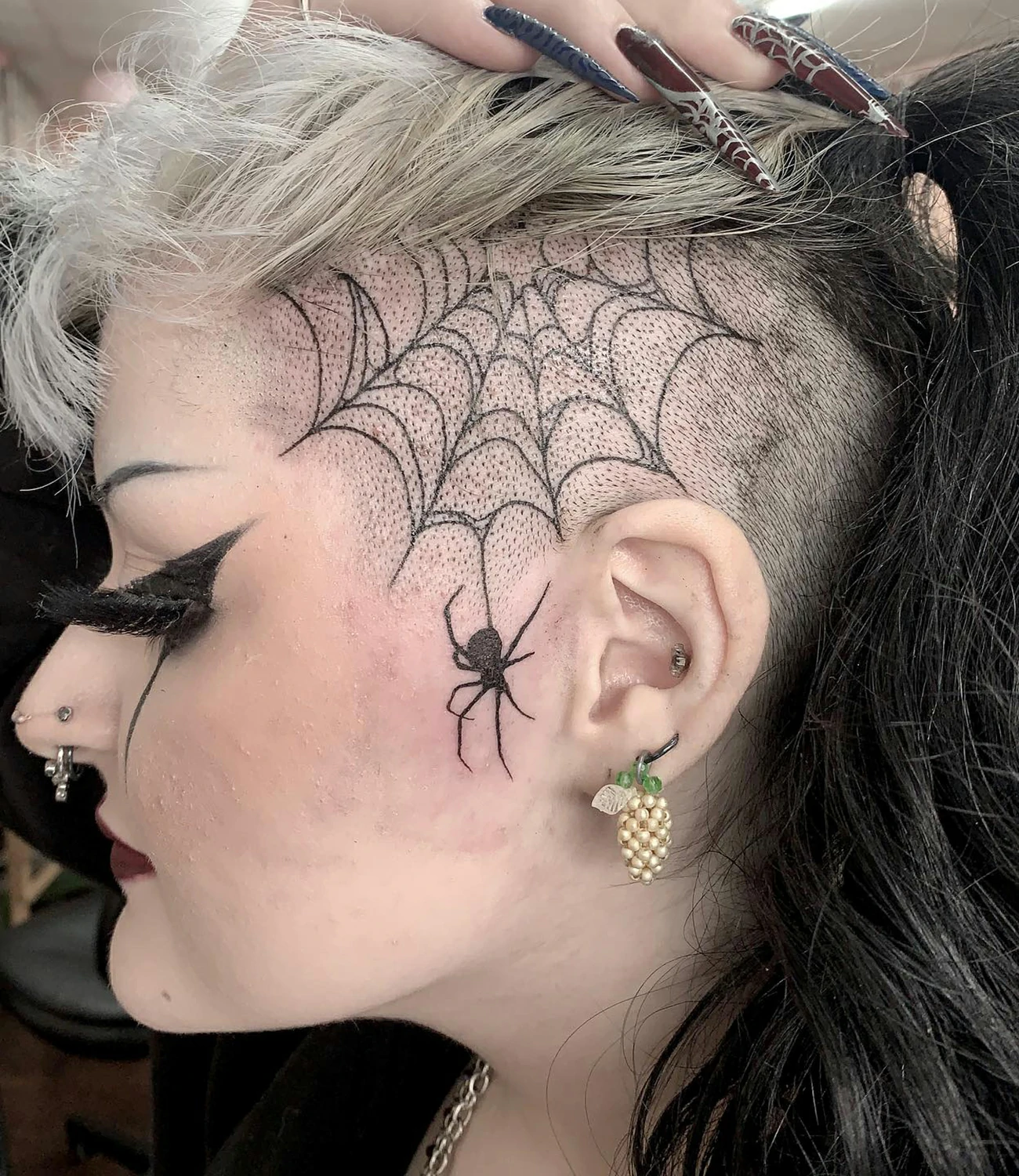 Sider face tattoo