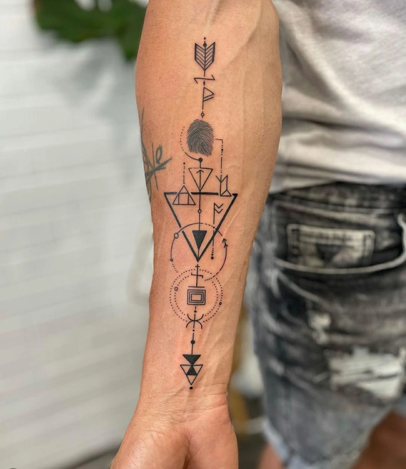 Geometric Arrow Tattoo
