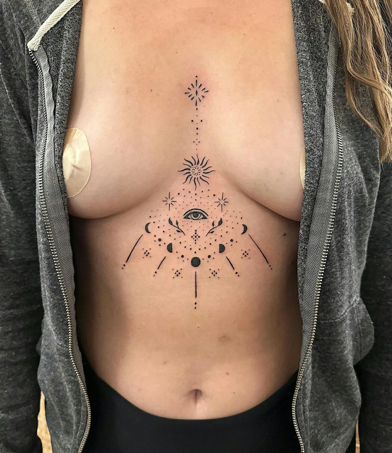 geometric sternum tattoos