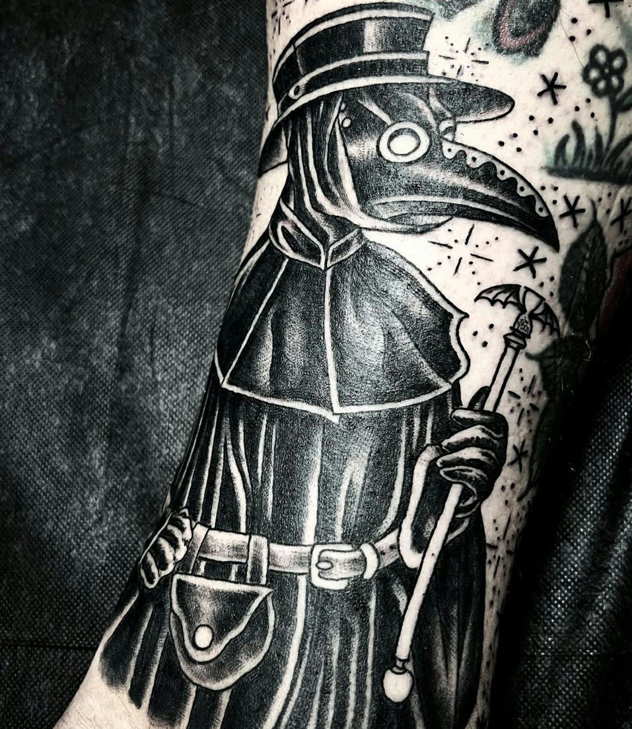 Raven eye tattoo: A design focusing on the intense and mysterious eye of a raven.