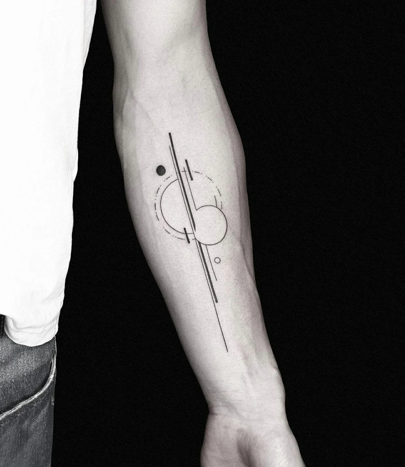 Minimalist Geometric Tattoo: Minimalist geometric tattoos focus on simplicity and clean lines, highlighting the elegance of basic shapes.
