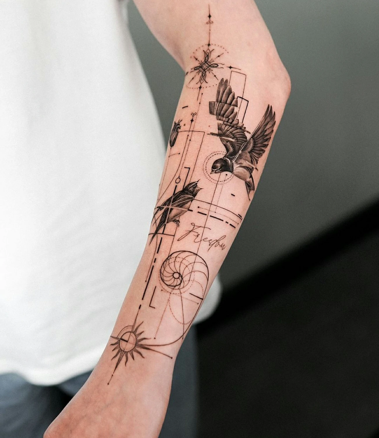geometric bird tattoo