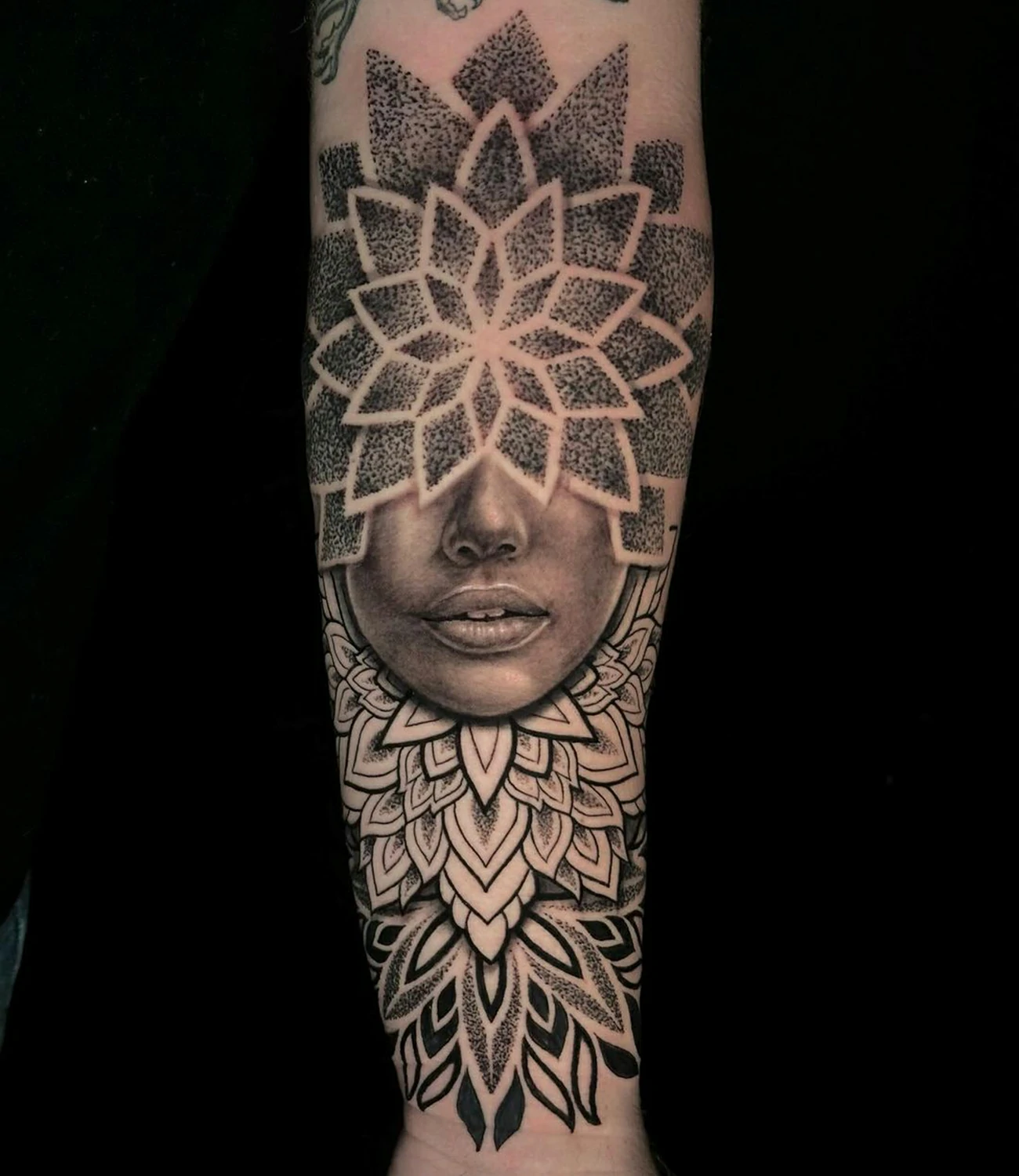 Geometric Mandala Tattoo: Geometric mandala tattoos are intricate designs that symbolize unity, balance, and spiritual growth.