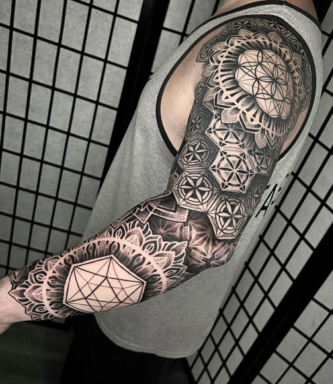 geometric arm tattoo