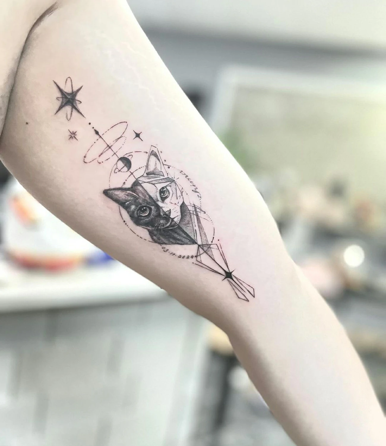 geometric cat tattoo