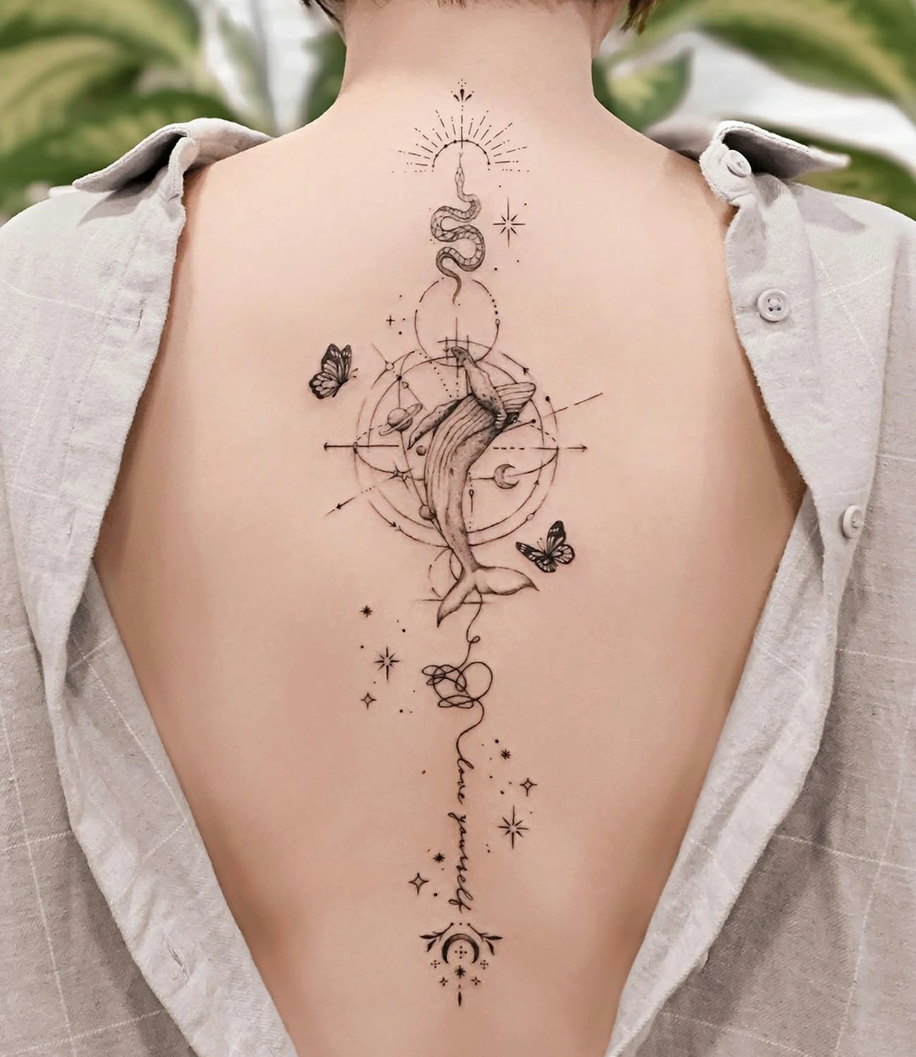 geometric spine tattoos