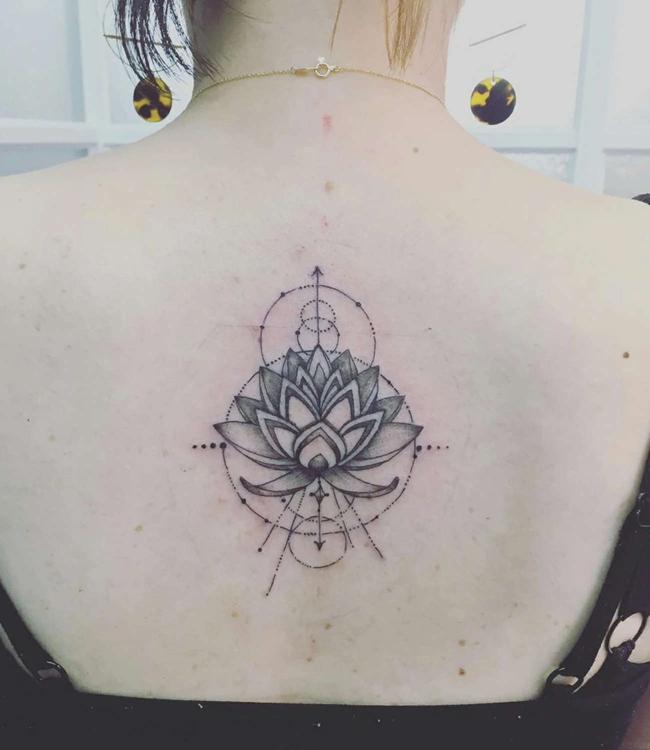 lotus geometric tattoo