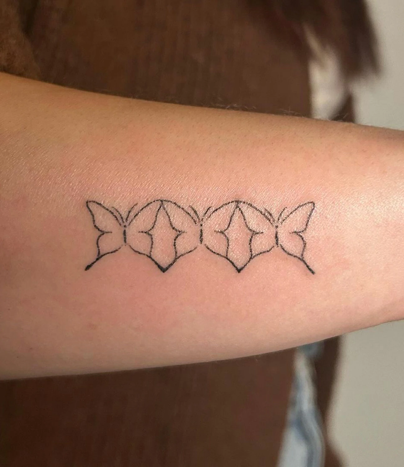 tiny geometric tattoos