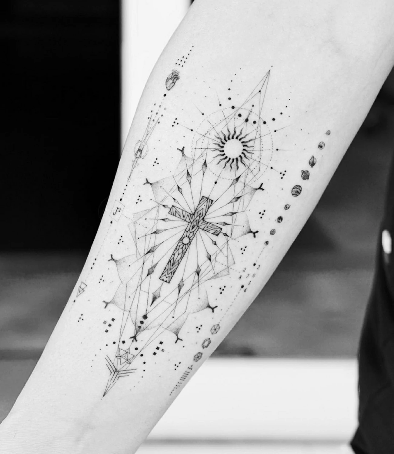 geometric cross tattoo