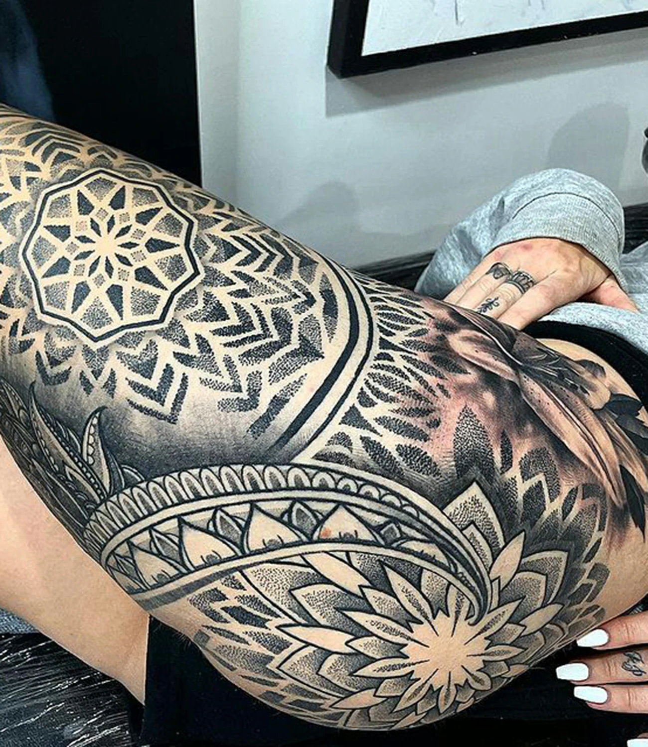 geometric thigh tattoo