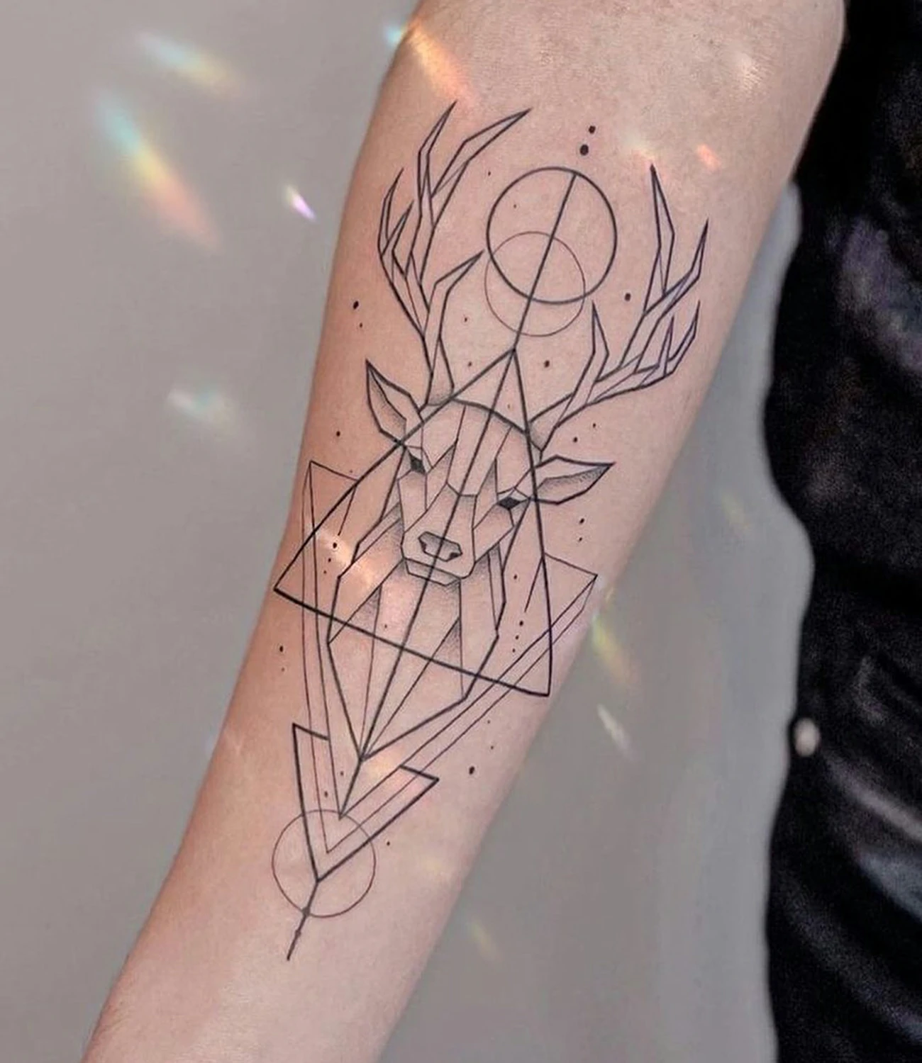 geometric line tattoo