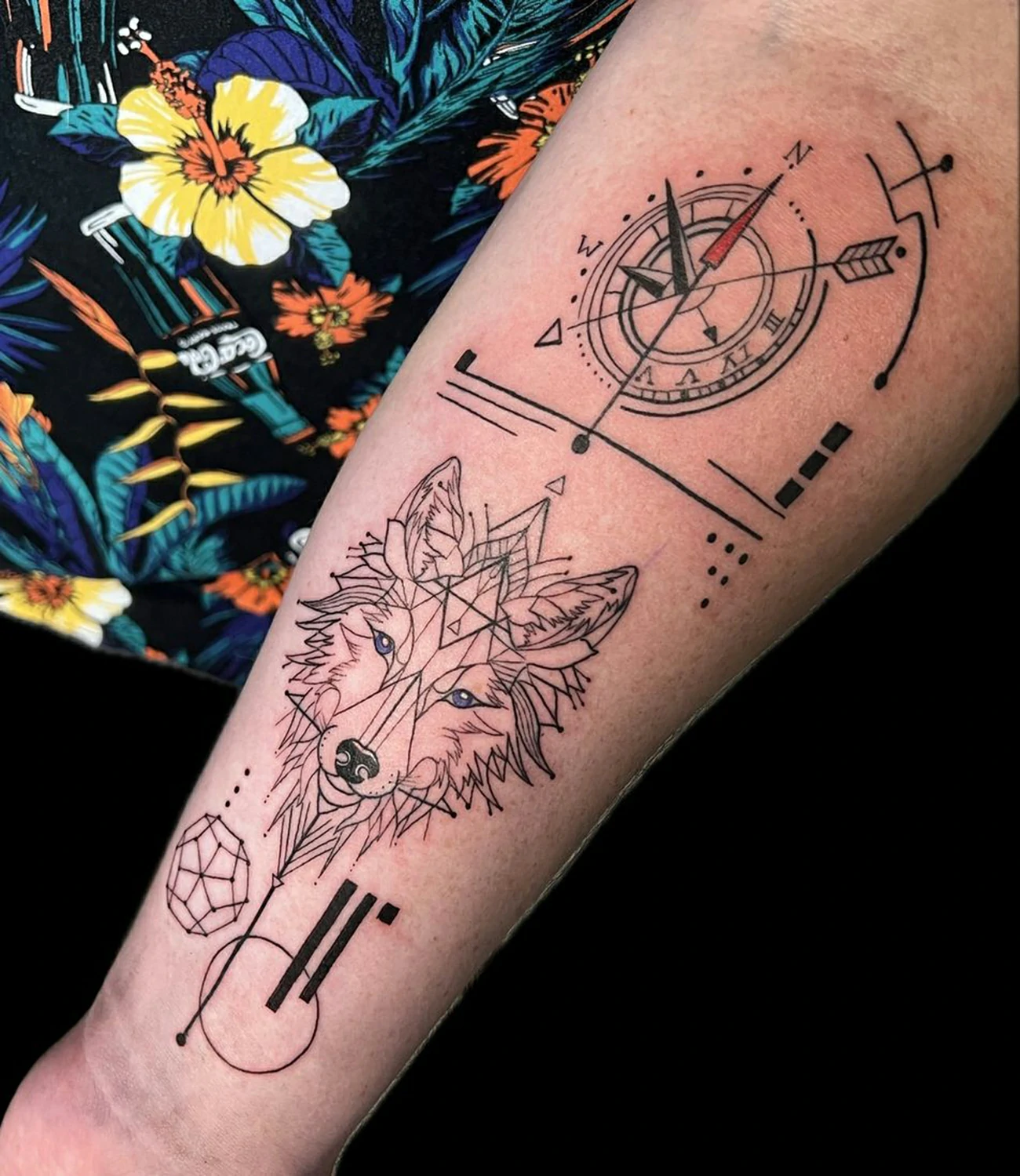 Geometric Wolf Tattoo: Geometric wolf tattoos combine the powerful imagery of a wolf with precise geometric shapes, symbolizing loyalty and strength