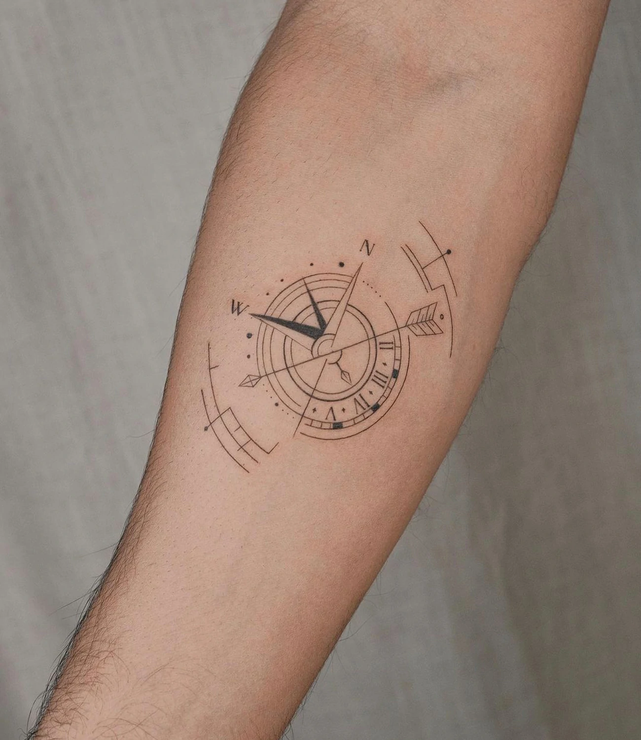 geometric compass tattoo